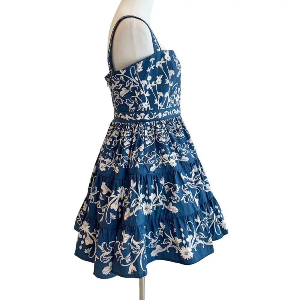 AGUA BY AGUA BENDITA Lima Ribbons tiered floral print cotton mini dress Dress