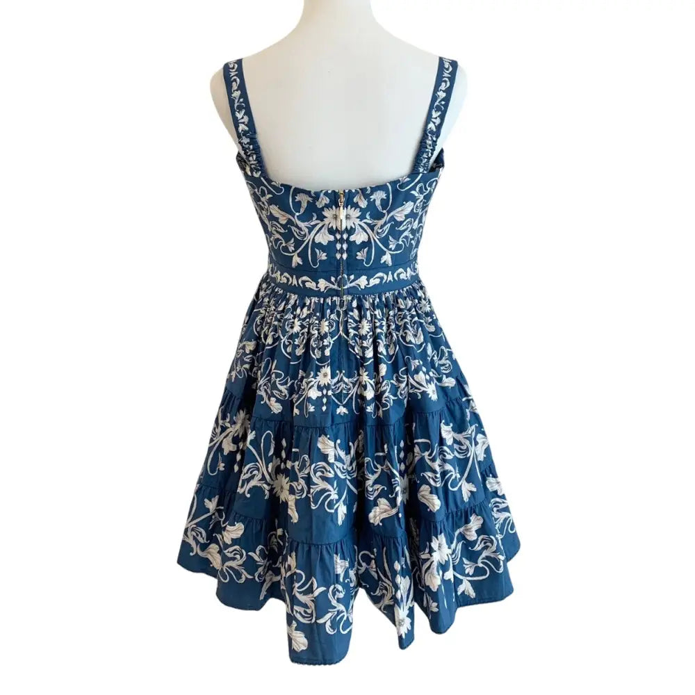 AGUA BY AGUA BENDITA Lima Ribbons tiered floral print cotton mini dress Dress