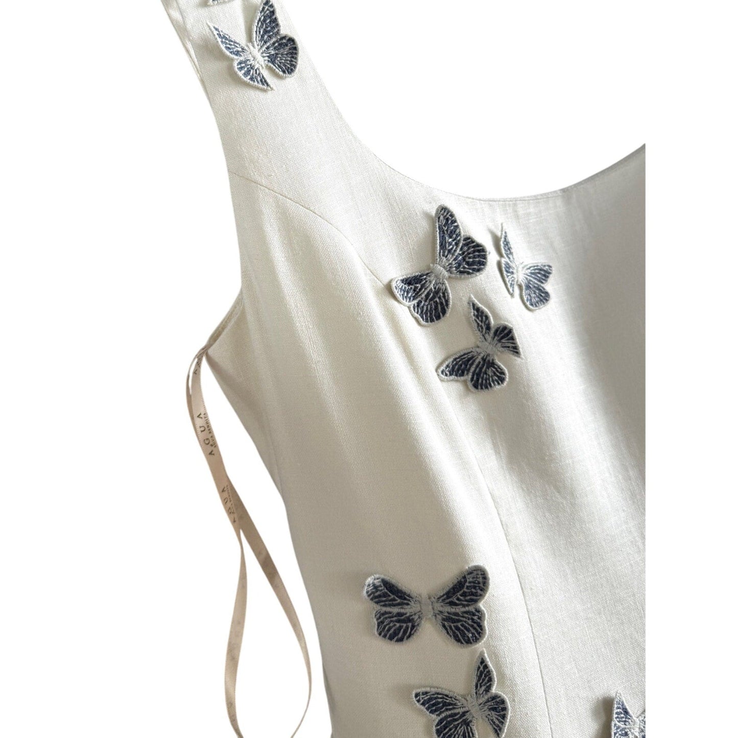 AGUA BY AGUA BENDITA Pluma Lymanopoda appliquéd gathered linen mini dress