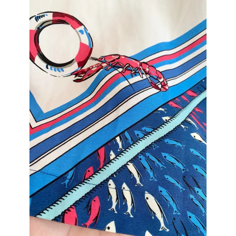 Alemais Apollo bow-detail printed minidress - Dress