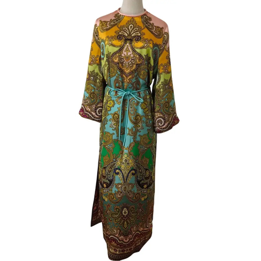 clemenza silk midi dress KIRNA ZABTE | The Clemenza Silk Shirtdress by Alemais an ornate tapestry of golden tones and paisley motifs, cut in fluid silk for effortless
